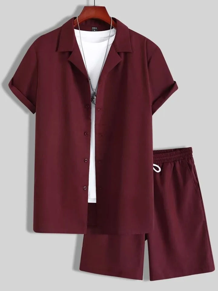 Man wearing a white short sleeve Cuban collar sport jacket with matching shorts.