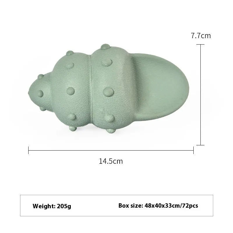 Blue rubber dog toy shaped like a shark conch for food dispensing and chewing.