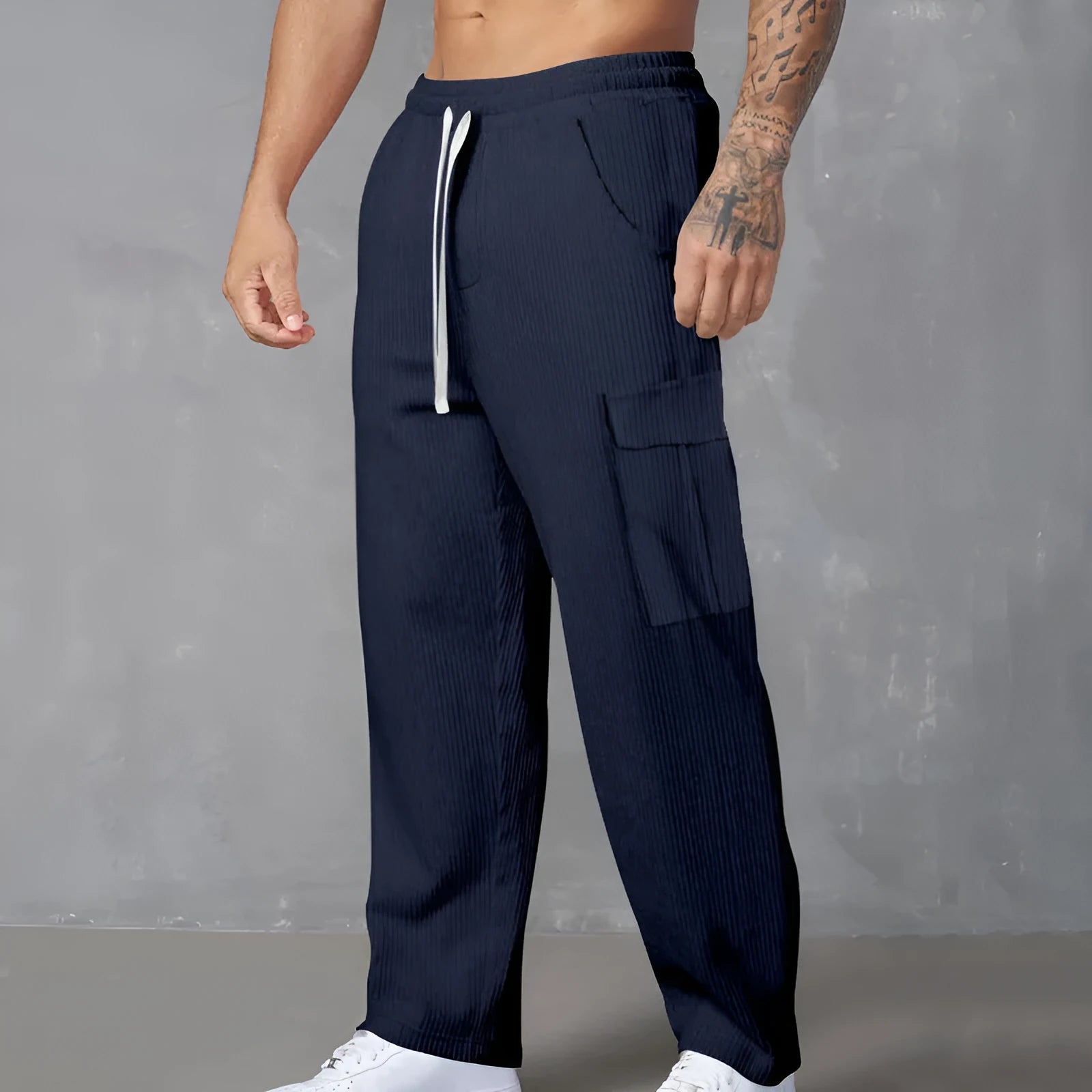 Men's corduroy cargo trousers in straight-leg wide-cut design with drawstring waist closure