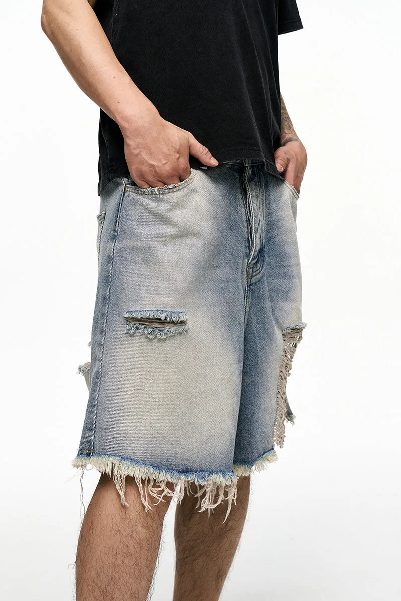 Light blue retro washed men's baggy denim shorts with a wide-leg cut and mid-waist.