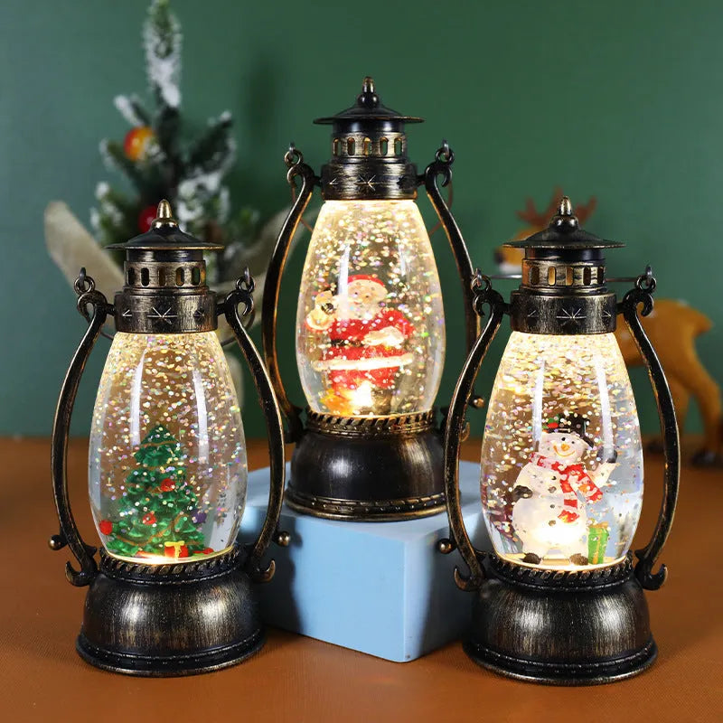 Plastic Christmas desktop oil lamp decoration with a glowing crystal ball and snowman figure.