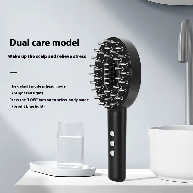 KD3802 Black handheld scalp massage device with charging cable on plain background