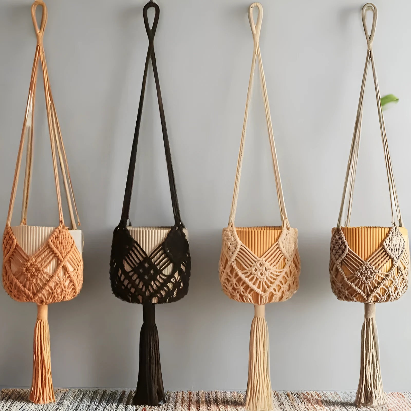 Hand-woven brown polyester cotton flower pot cover with a net pocket on the side.