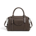 Genuine leather ladies handbag with contrast stitching and lock detail in street style