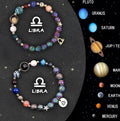 Two natural stone beaded bracelets showing zodiac sign designs on a textured background.