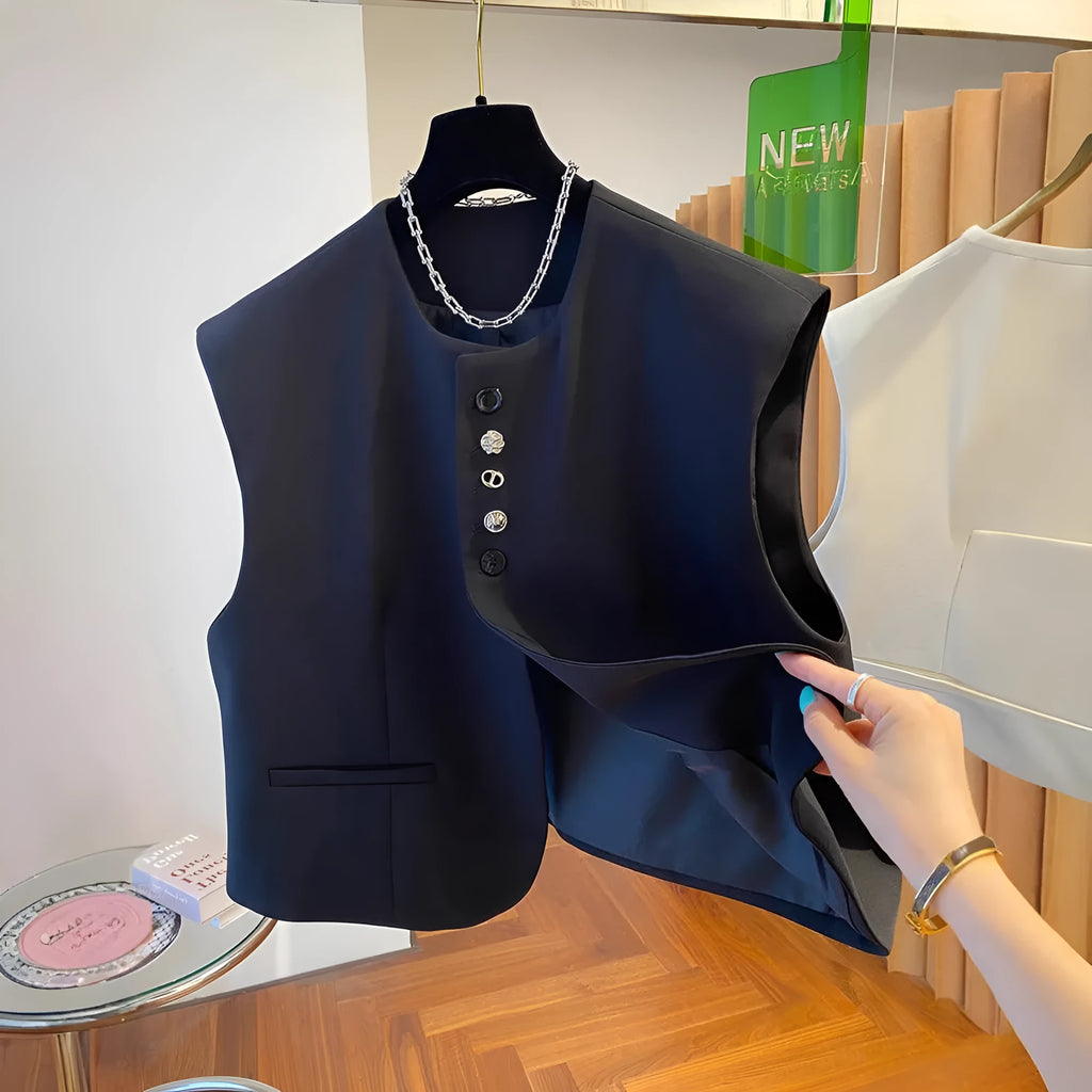 Women's loose-fitting beige polyester waistcoat vest with pockets on a hanger.
