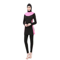 Conservative women's long sleeve swimsuit with hood in black and rose red, showing separate top and trousers.