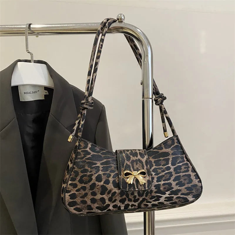 Casual PU leather handbag with sandwich pocket in black colour showing dimensions and design