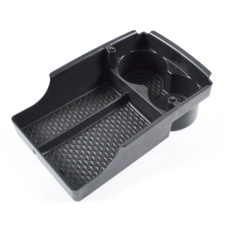 Plastic storage box designed for retrofitting into a Tesla Model 3, S, or X central control armrest.