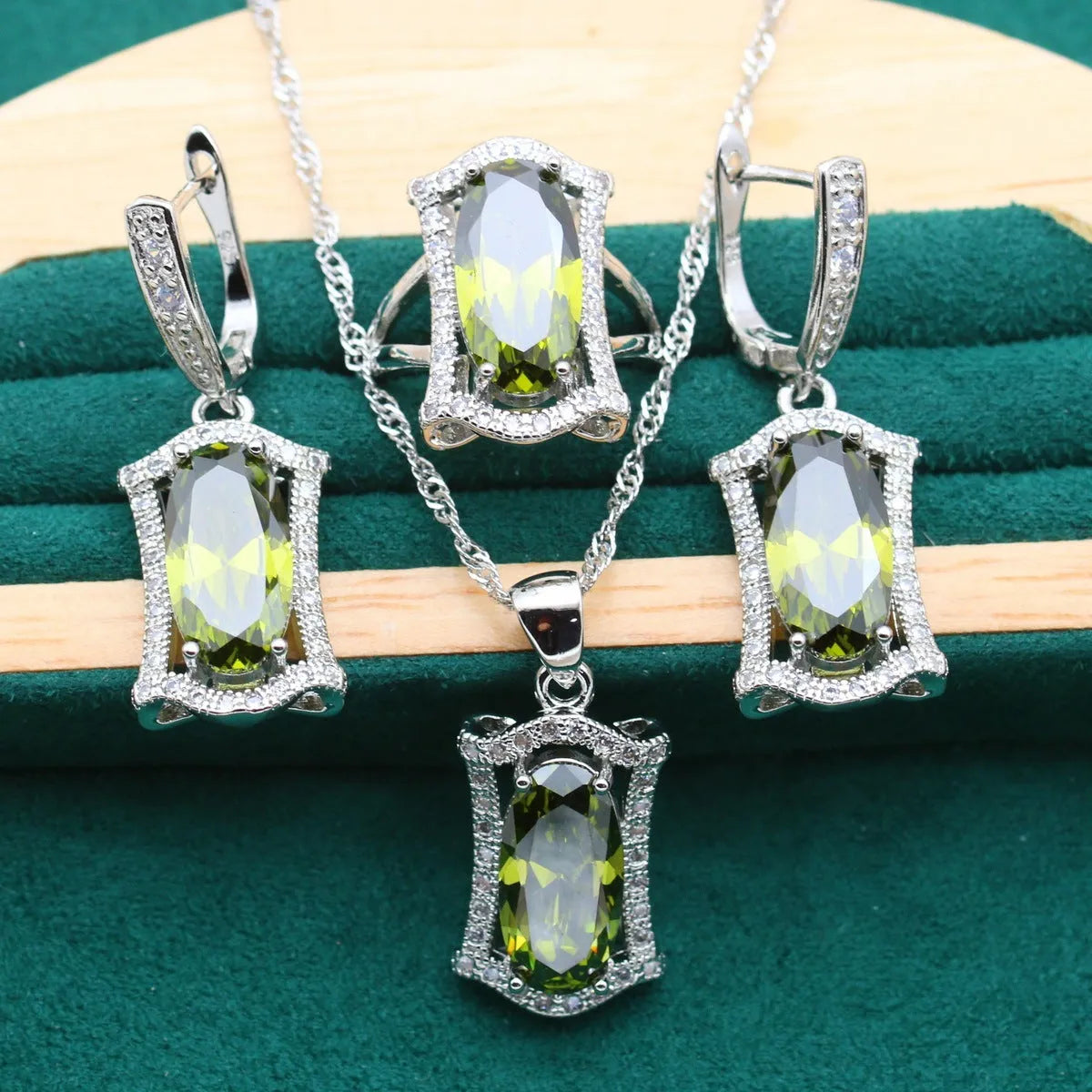 Anti-allergy zircon jewellery set showing matching necklace, earrings, ring and bracelet with snake chain detail