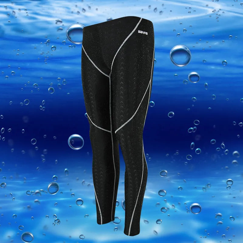 Men's black nylon cropped swimming trunks with a coloured line detail and brief style