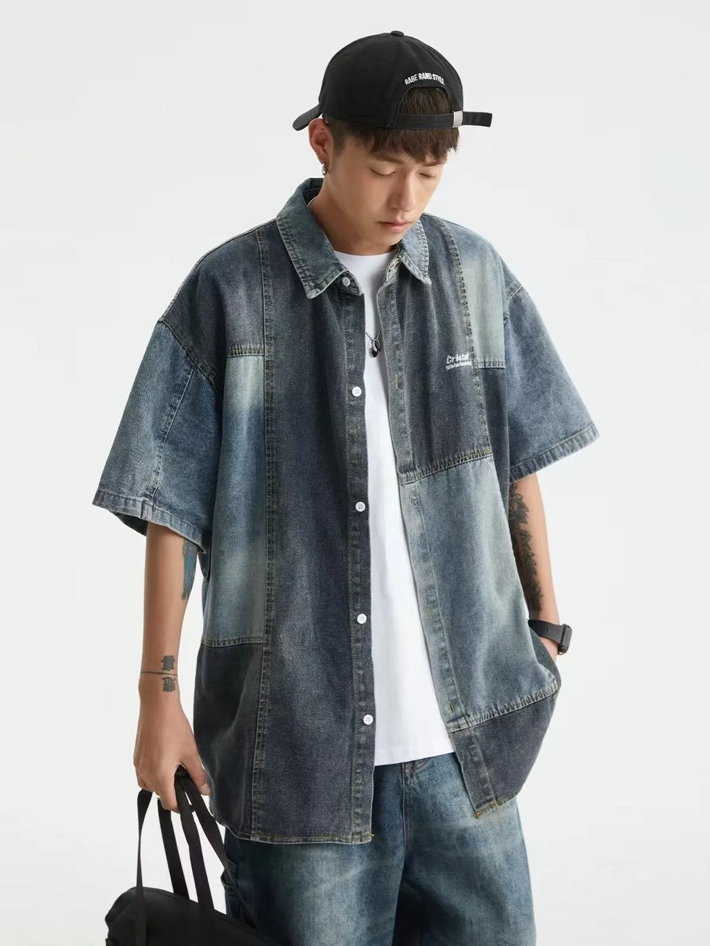 Blue Japanese-style loose-fit denim shirt for men with washed stitching detail.