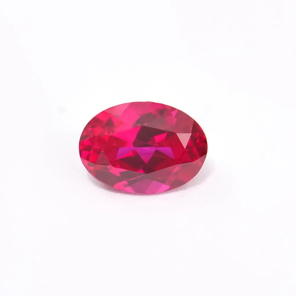 Artificial pigeon blood red ruby gemstone in various cuts: egg, round, princess, water drop, grandmother, and Asche.