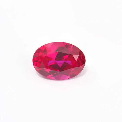 Artificial pigeon blood red ruby gemstone in various cuts: egg, round, princess, water drop, grandmother, and Asche.