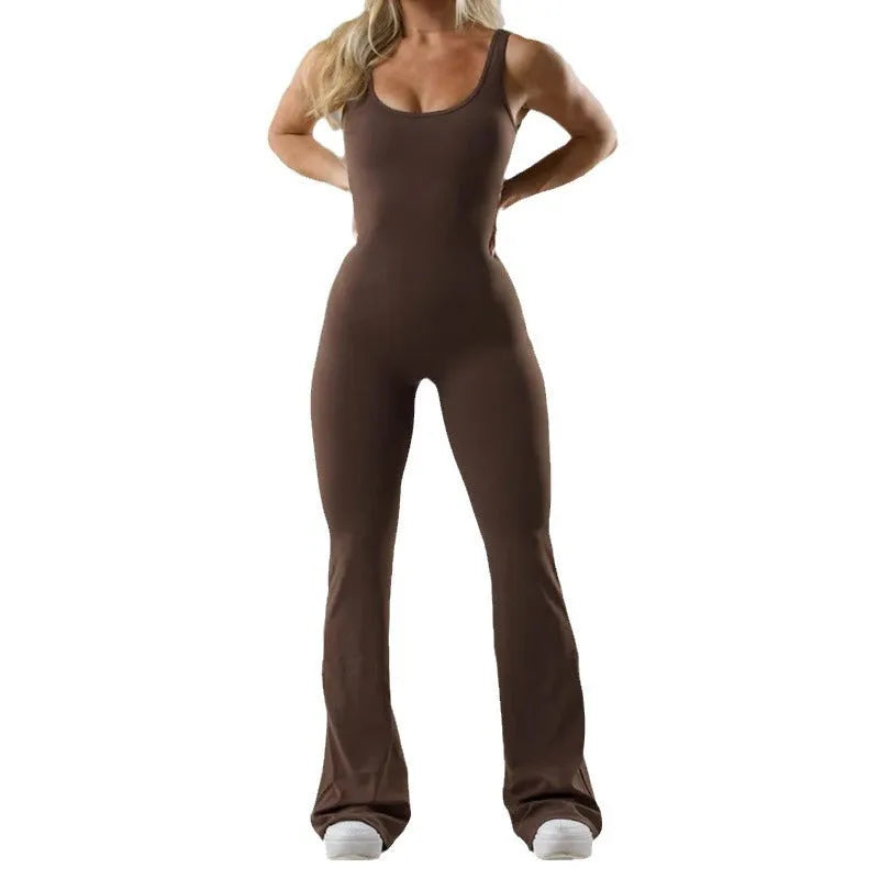Women's black seamless yoga bodysuit jumpsuit with hollow out design and mid waist