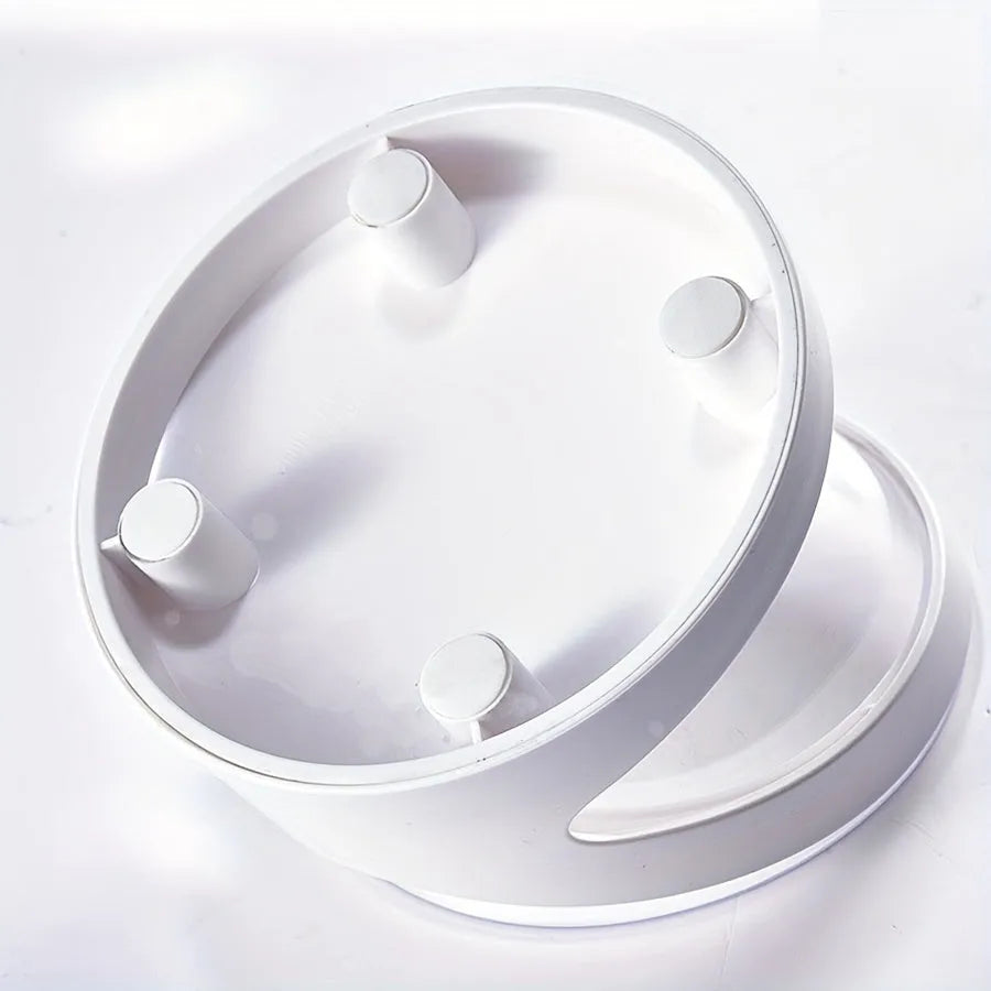 White elevated plastic cat food bowl with a slanted design for comfortable feeding.