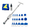 Automotive dent repair tool with T-shaped hammer and blue adhesive pads for car body panel repairs