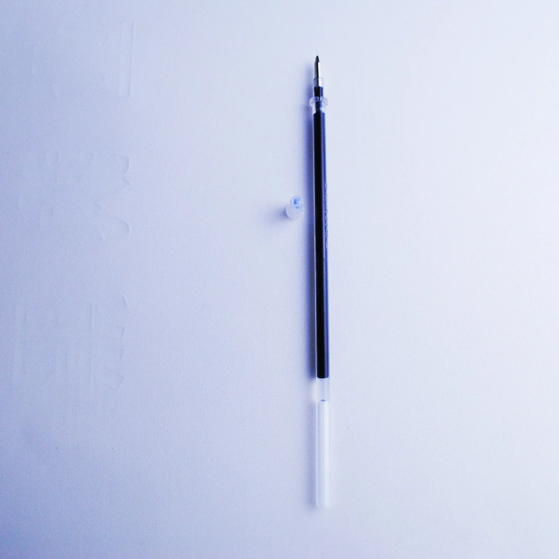 Blue ink automatic fading pen set with 0.5mm tip, eight refill cores, pole, and pen holder