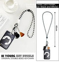 Cute little black cat cartoon design plastic card holder with metal pendant attachment.