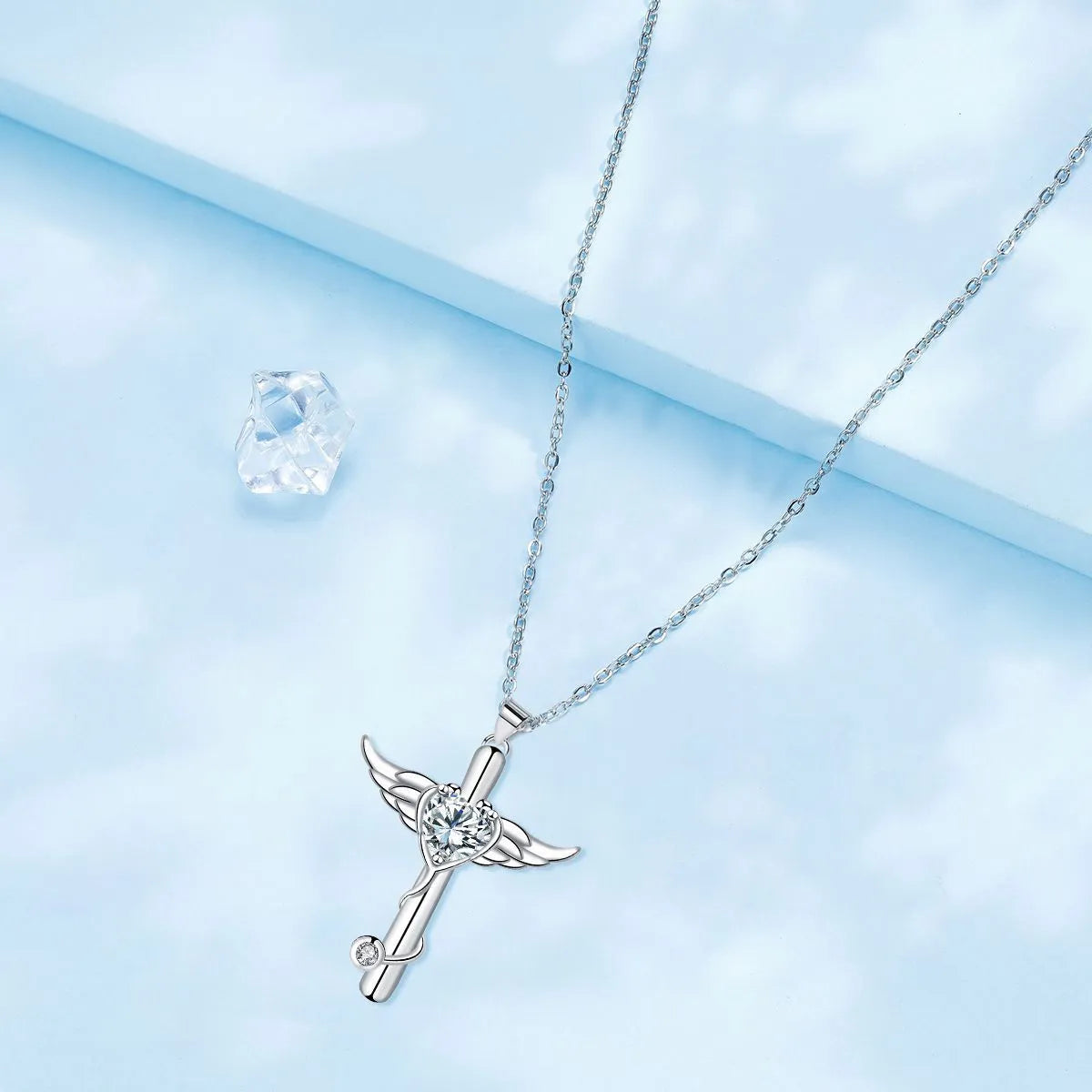 Wings cross stethoscope necklace in electroplated copper available in white or red diamond colours