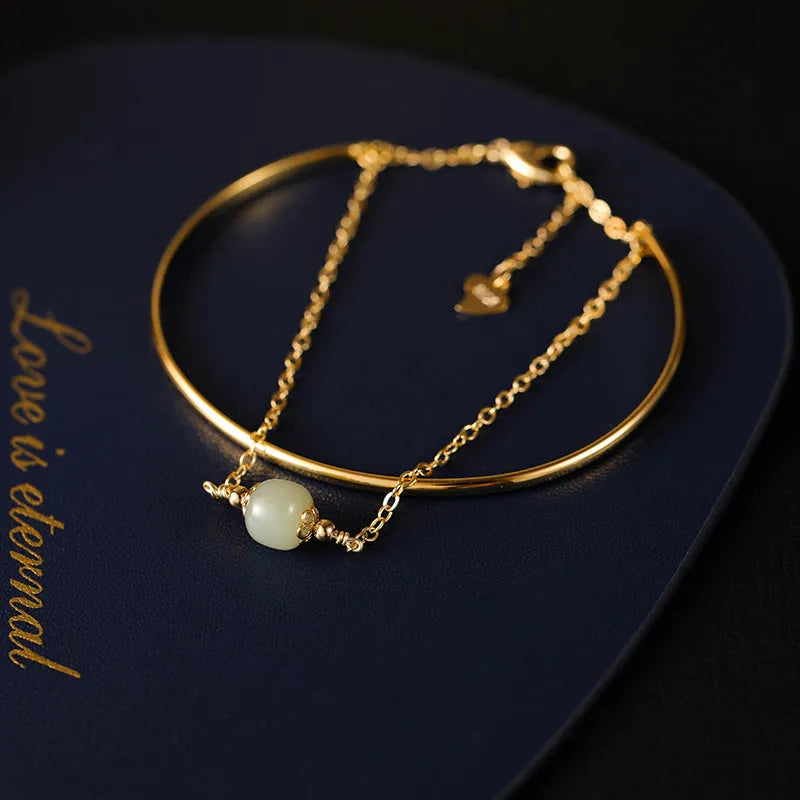 Women's Hetian jade bead bracelet with gold inlay detailing in single, double and three bead versions