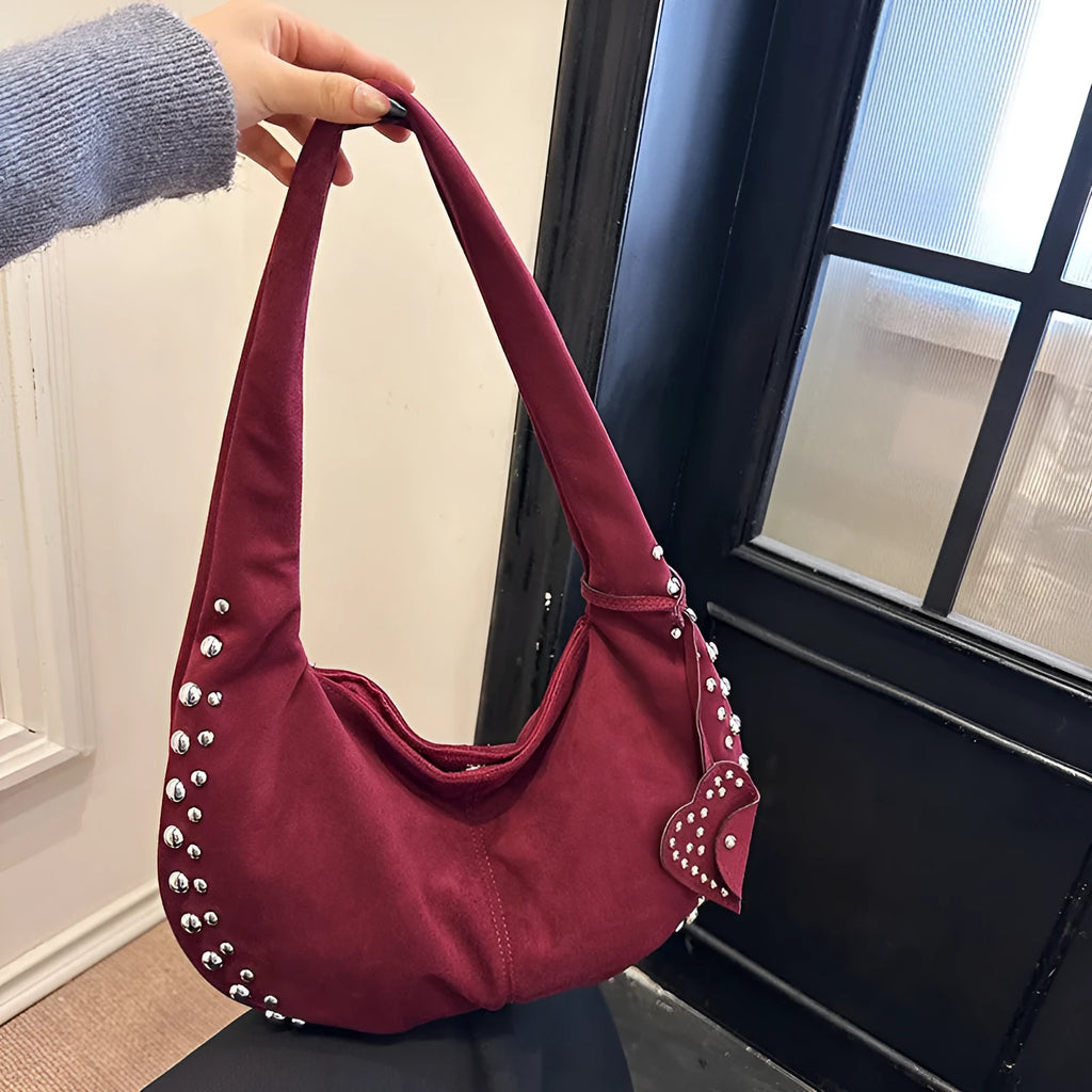 Soft plush women's tote handbag in retro style, carried underarm.