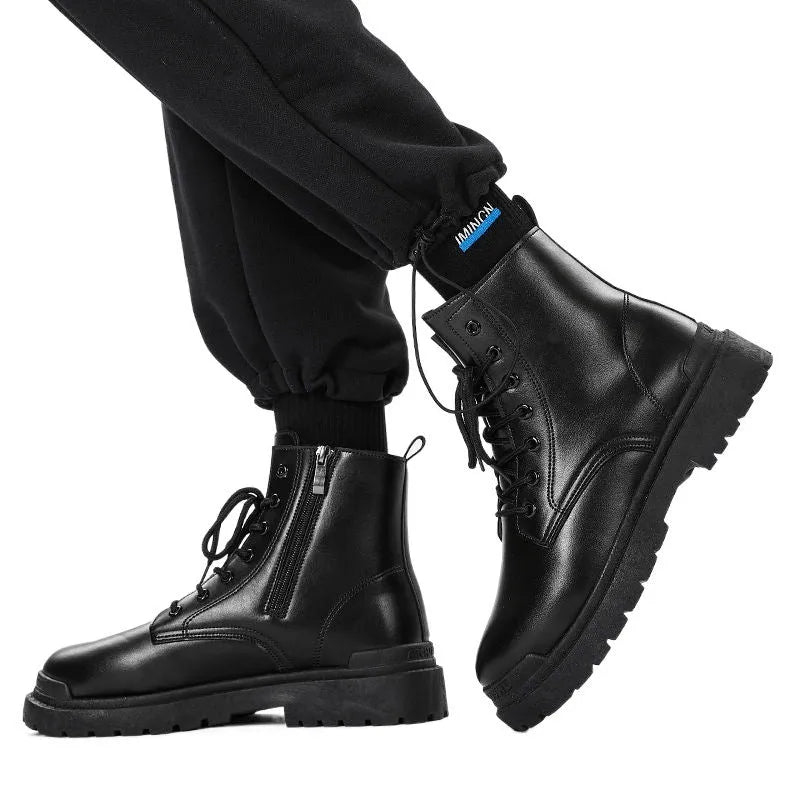 Men's black mid-top Tide British leather boots with a flat rubber sole on a neutral background.