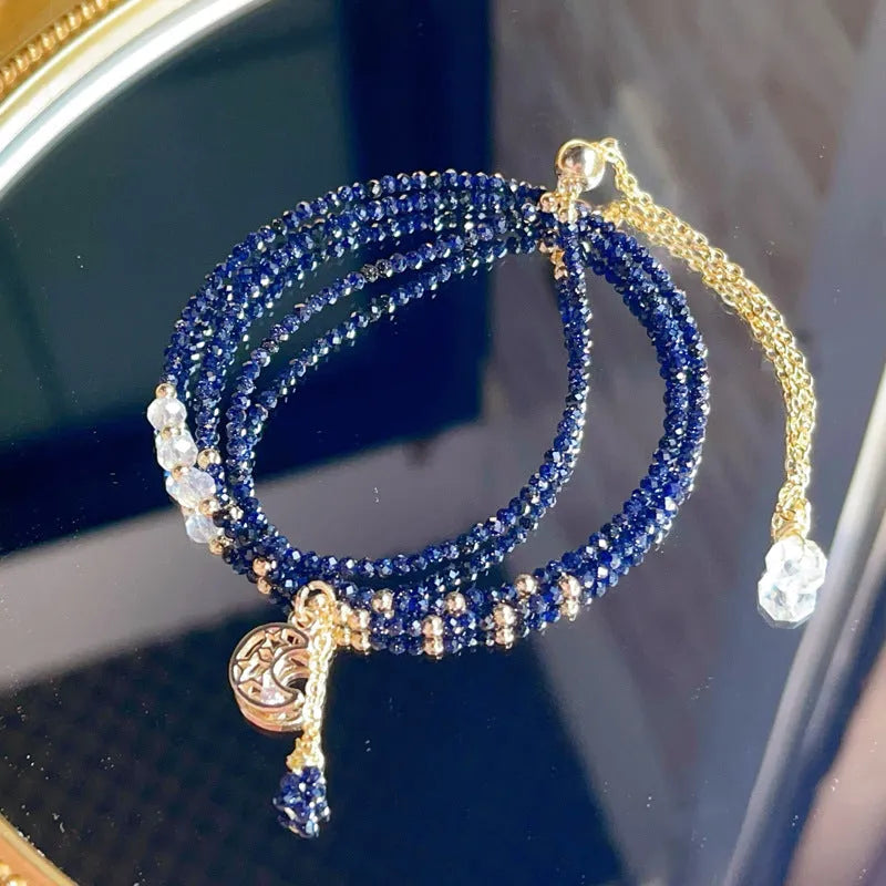 Women's blue sand stone three-ring multi-layer bracelet showing interconnected design