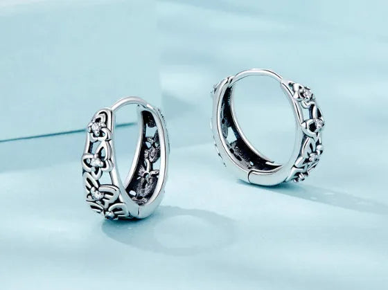 Sterling silver retro butterfly earrings with zircon detailing measuring 14mm tall