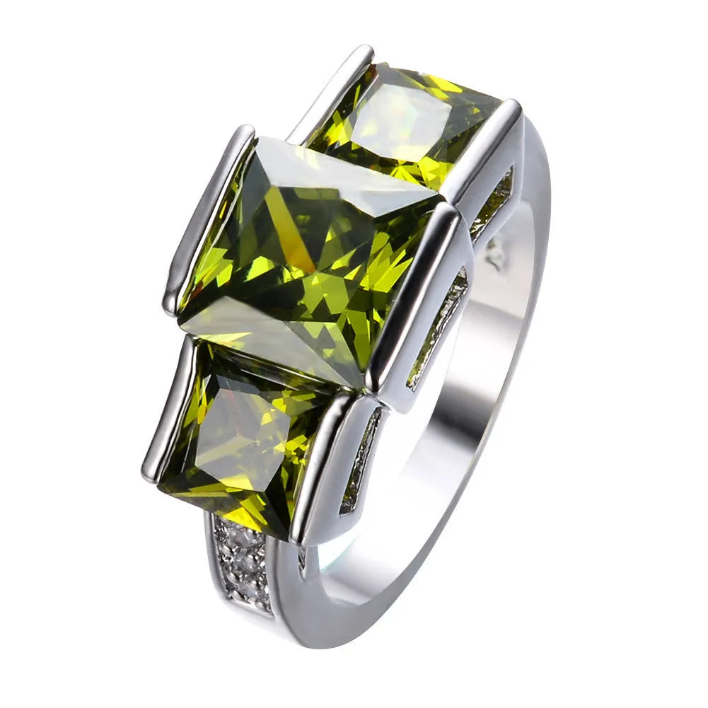 Copper electroplated colourful ring ornament in geometric design showing multiple colour options