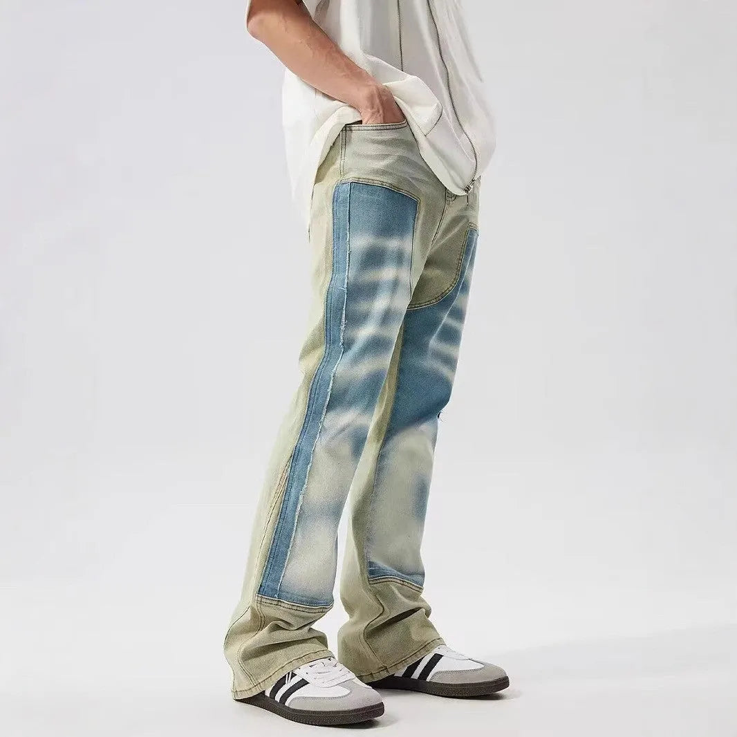 Retro yellow and blue patchwork jeans with splash-ink damaged design on polyester denim fabric