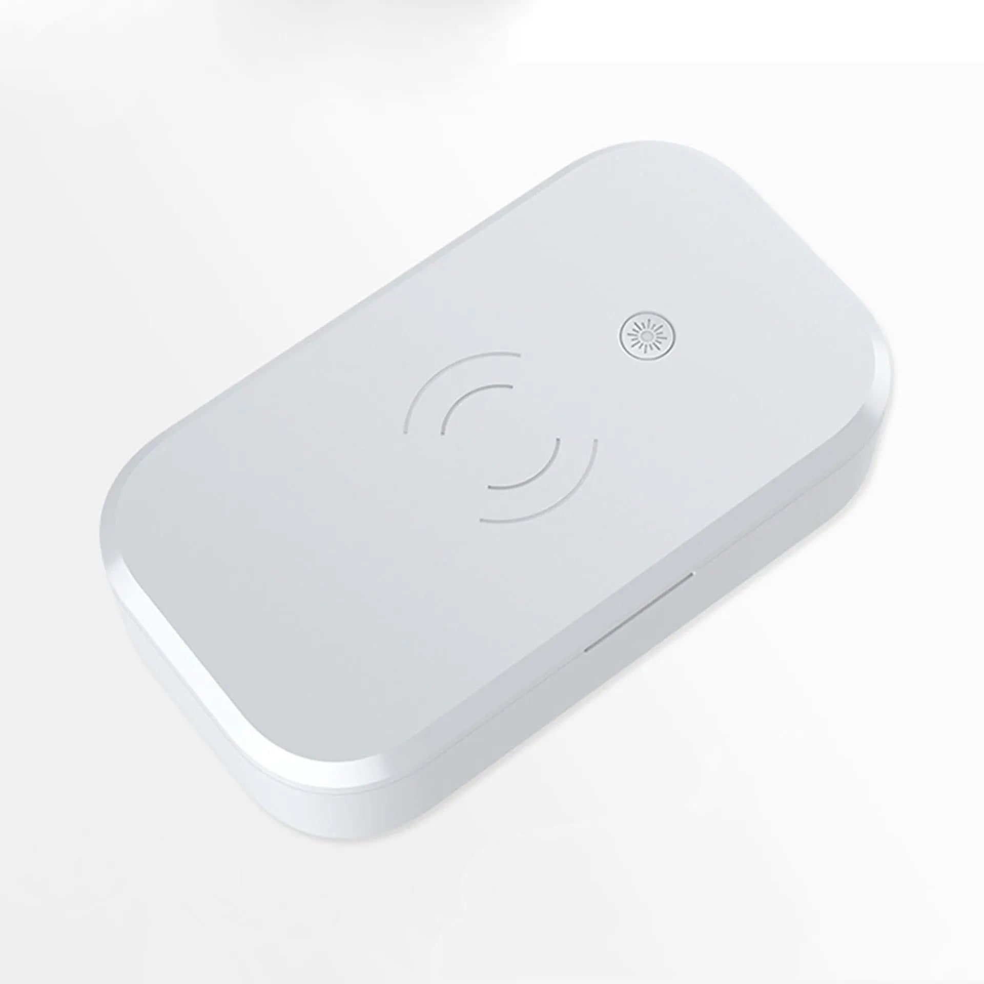 White ultraviolet disinfection box with wireless charging pad for nail tools and mobile phones