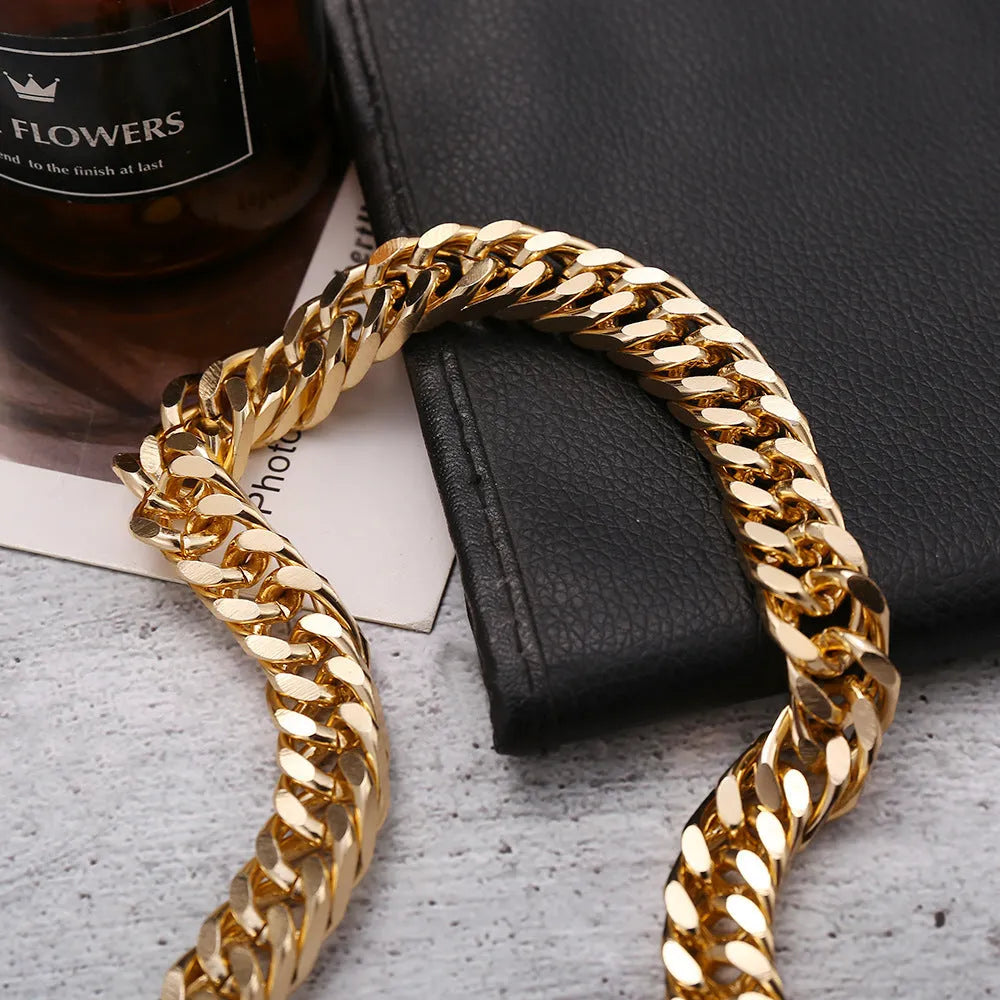 Women's gold electroplated thick chain necklace showing 32cm length and alloy construction