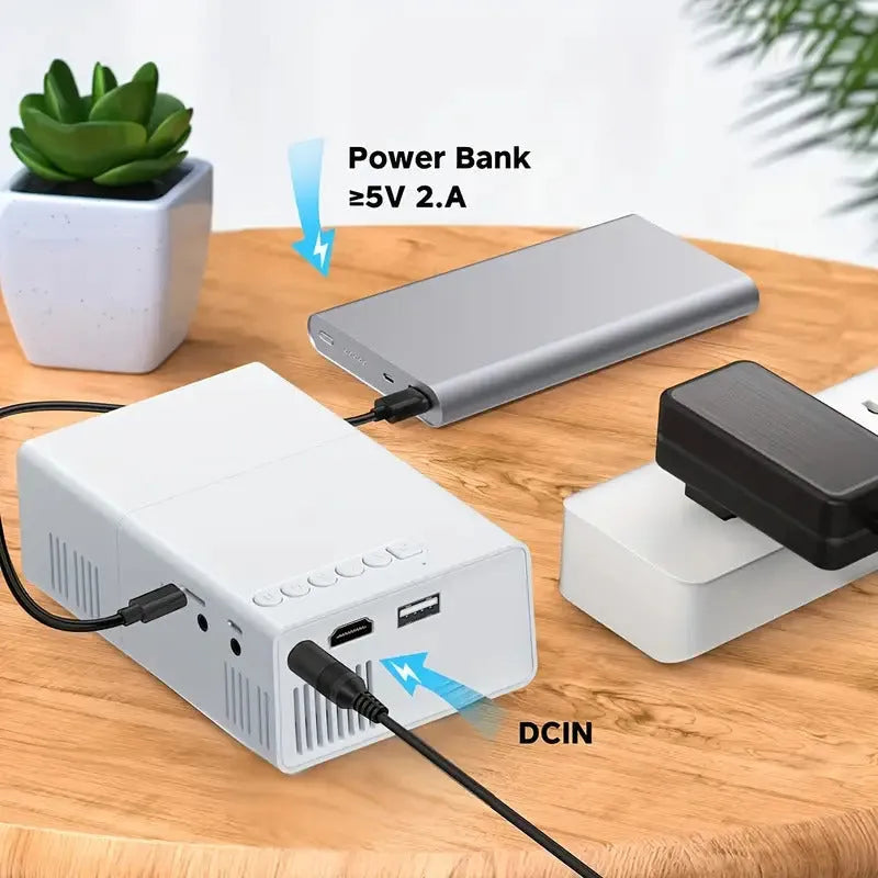 M100 mini projector in black or white with remote control and cables
