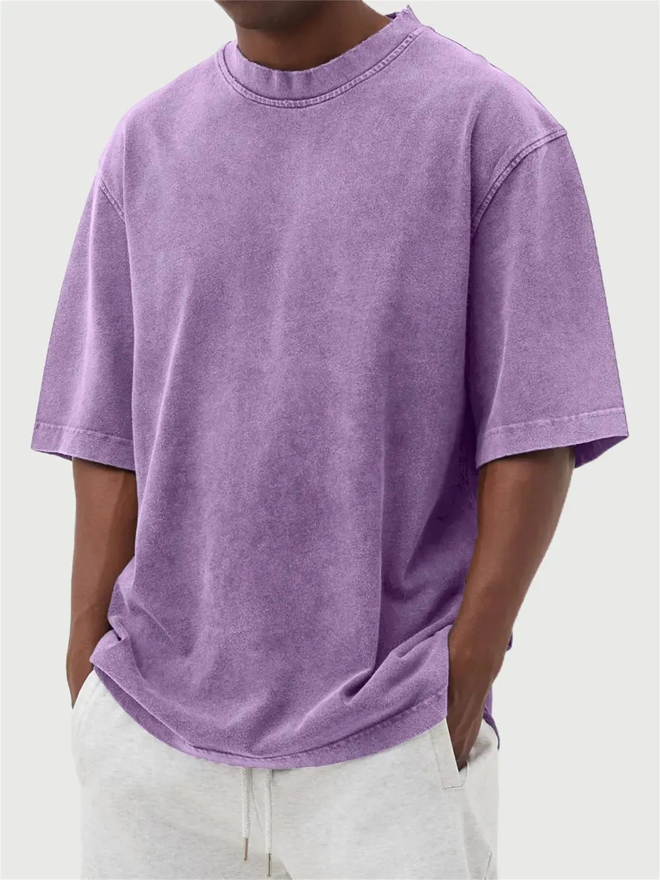 Men's loose fit distressed pullover t-shirt in stone washed polyester showing half sleeve design