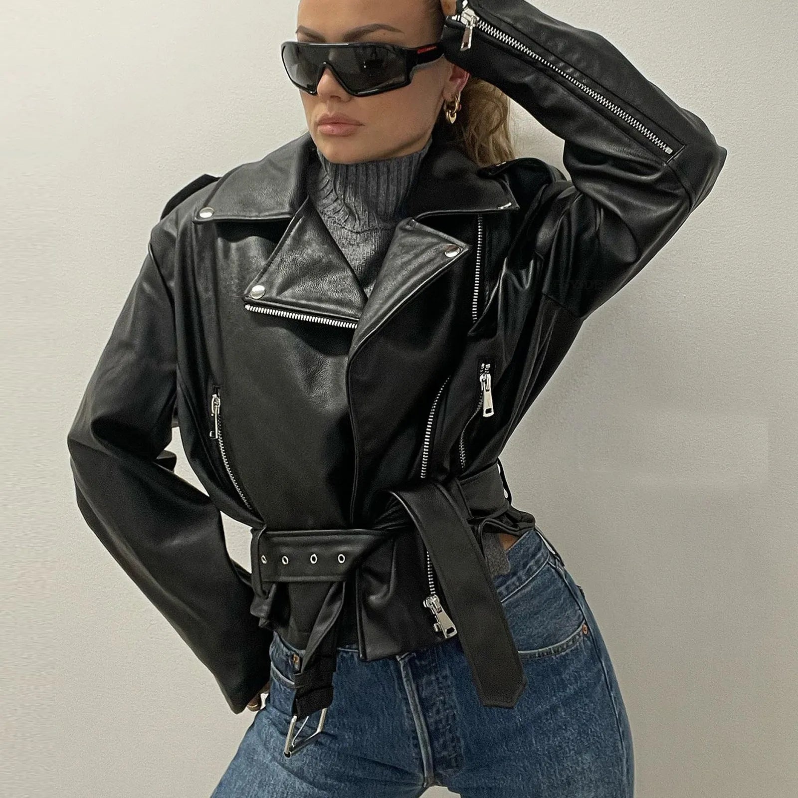 Punk style leather jacket with locomotive lapel and Peter Pan collar in polyester construction