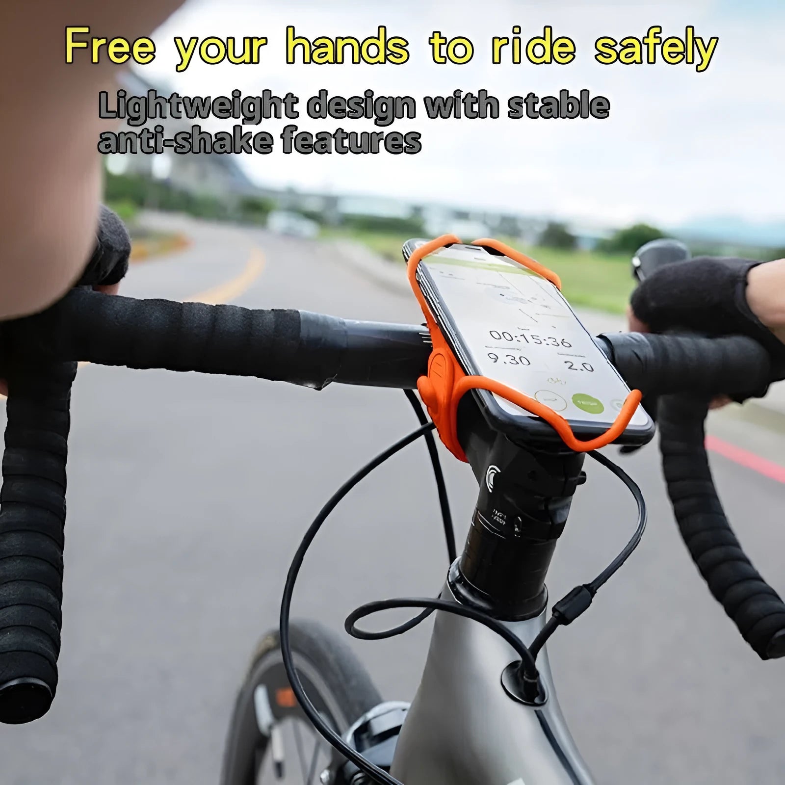 Black adjustable plastic road bike phone mount attached to bicycle handlebar