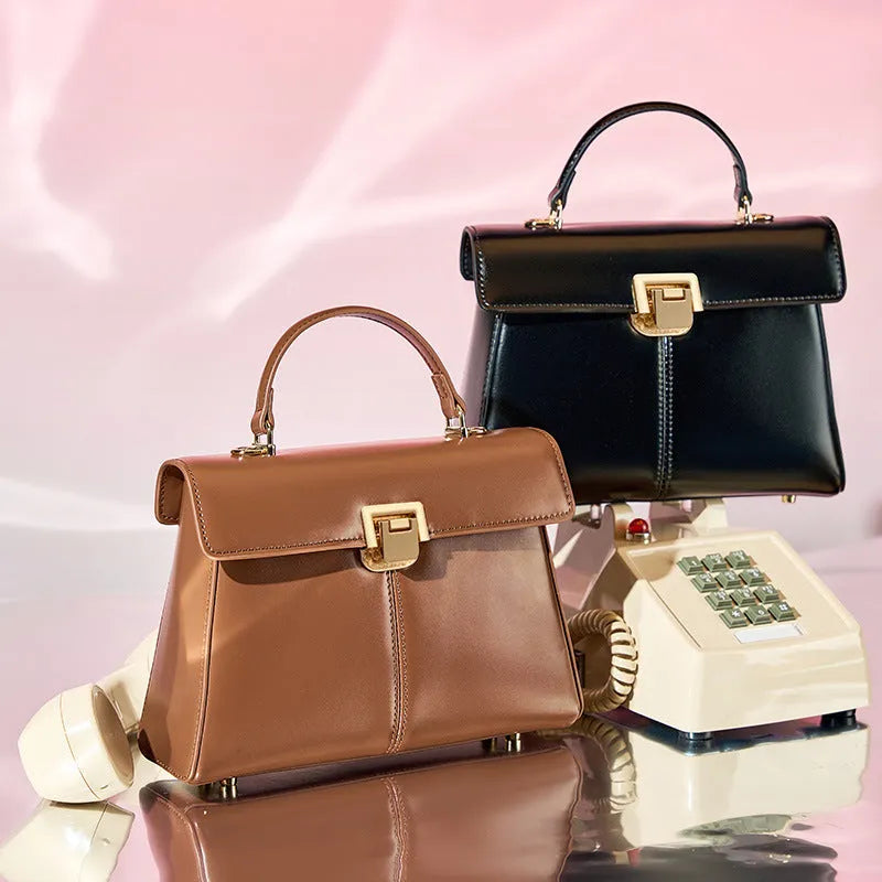 Women's black genuine leather shoulder bag with vachette clasp in horizontal square shape