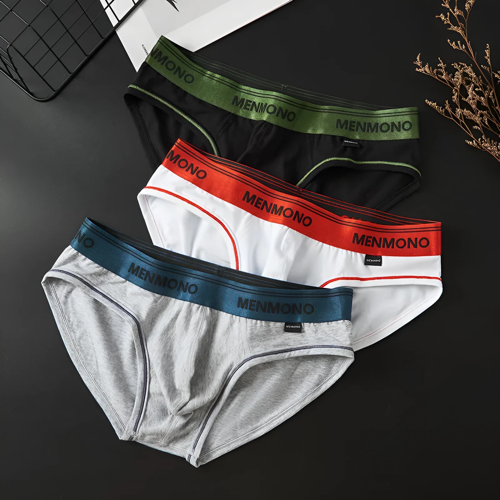 Men's low waist cotton briefs in solid colour combinations showing knitted fabric detail