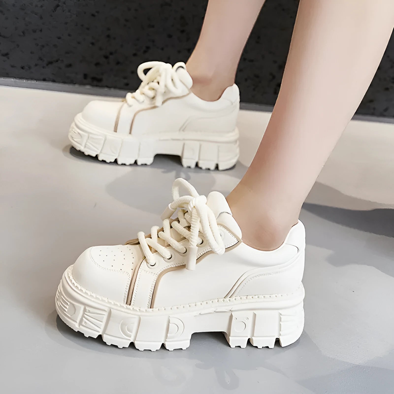 Women's beige leather casual shoes with subtle platform muffin bottom sole design