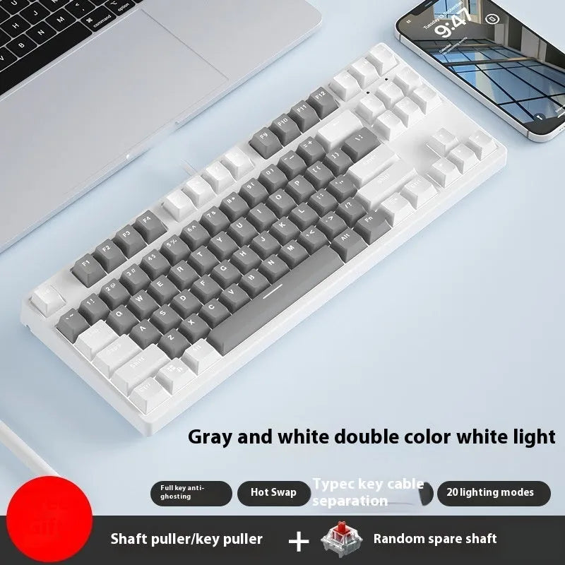 87-key wired mechanical gaming keyboard with hot-swappable switches shown in a two-tone colour scheme on a metal chassis.