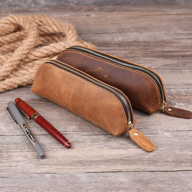 Square leather pencil case with zipper closure in black, brown, dark brown, or yellow colour