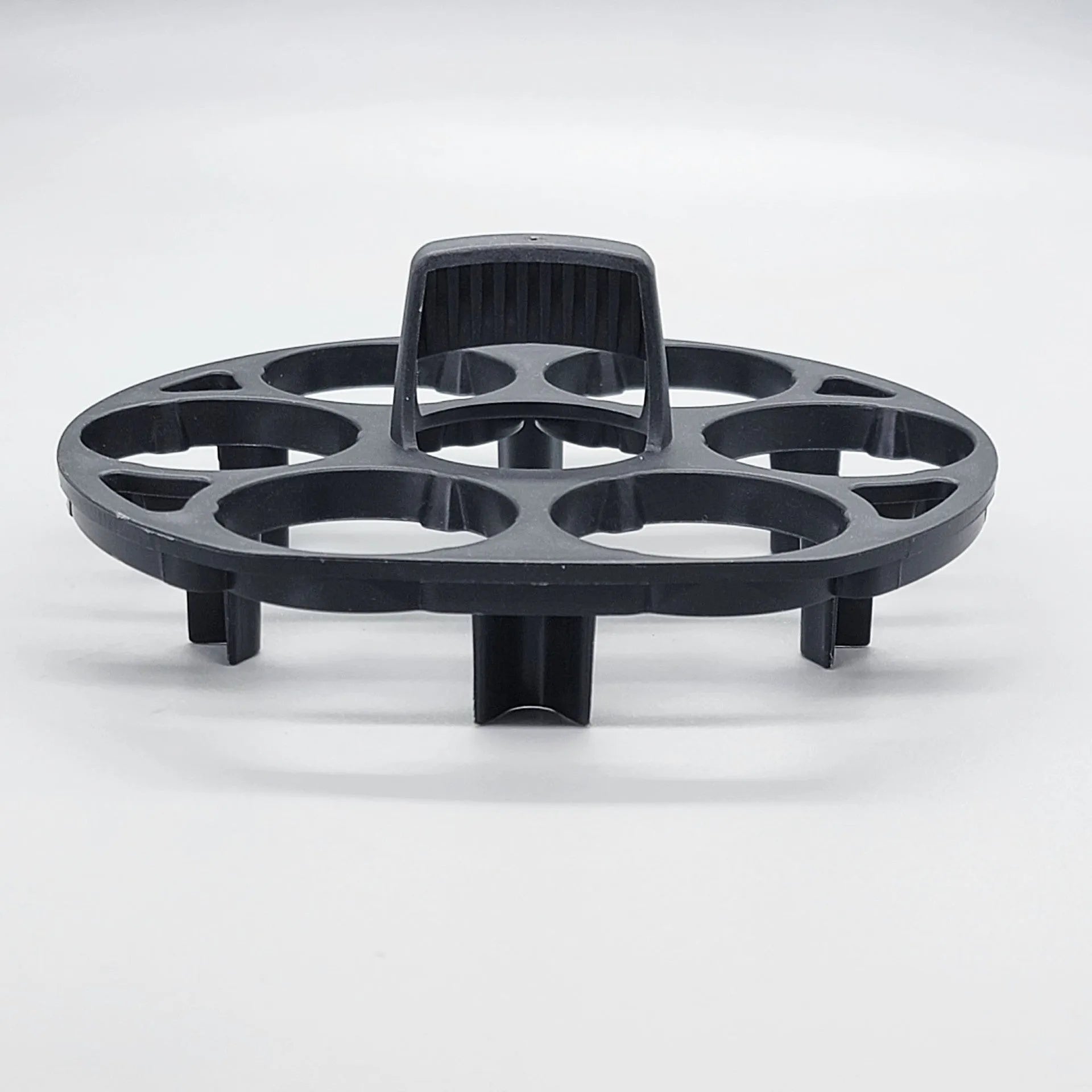 Black plastic egg holder basket with retainer, dimensions 13.8 by 12.6 cm.