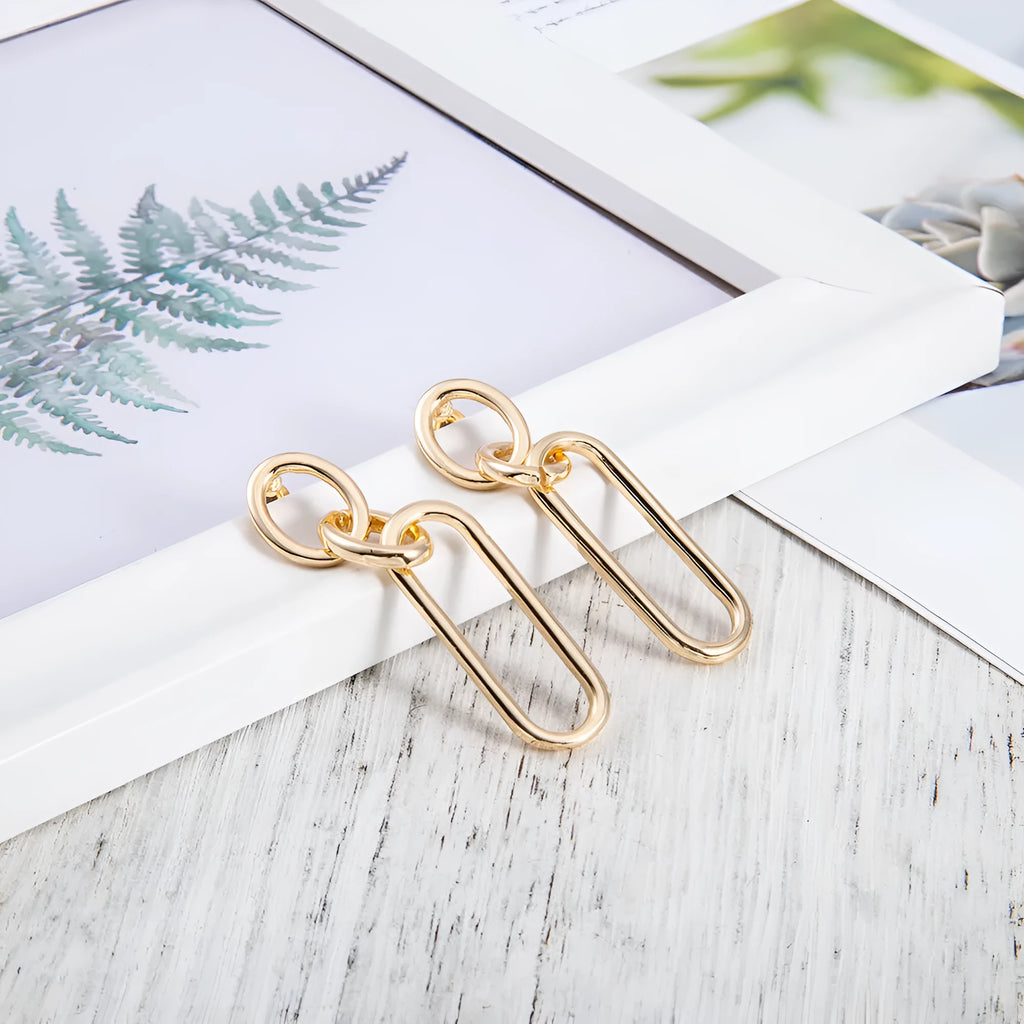 Geometric sterling silver needle colour hoop earrings for women with an alloy construction.