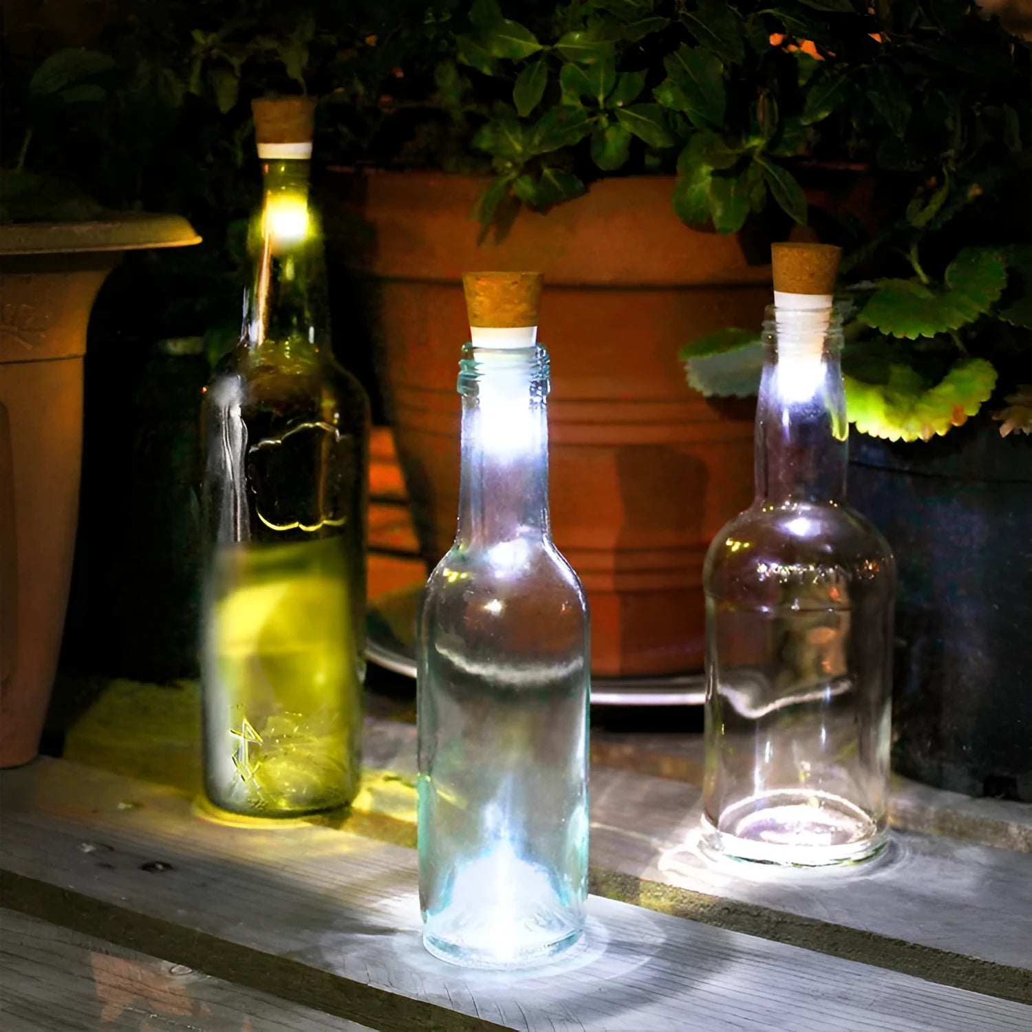 White plastic rechargeable LED bottle cap light with 15 LEDs, shown with battery box, measuring 30mm by 73mm.