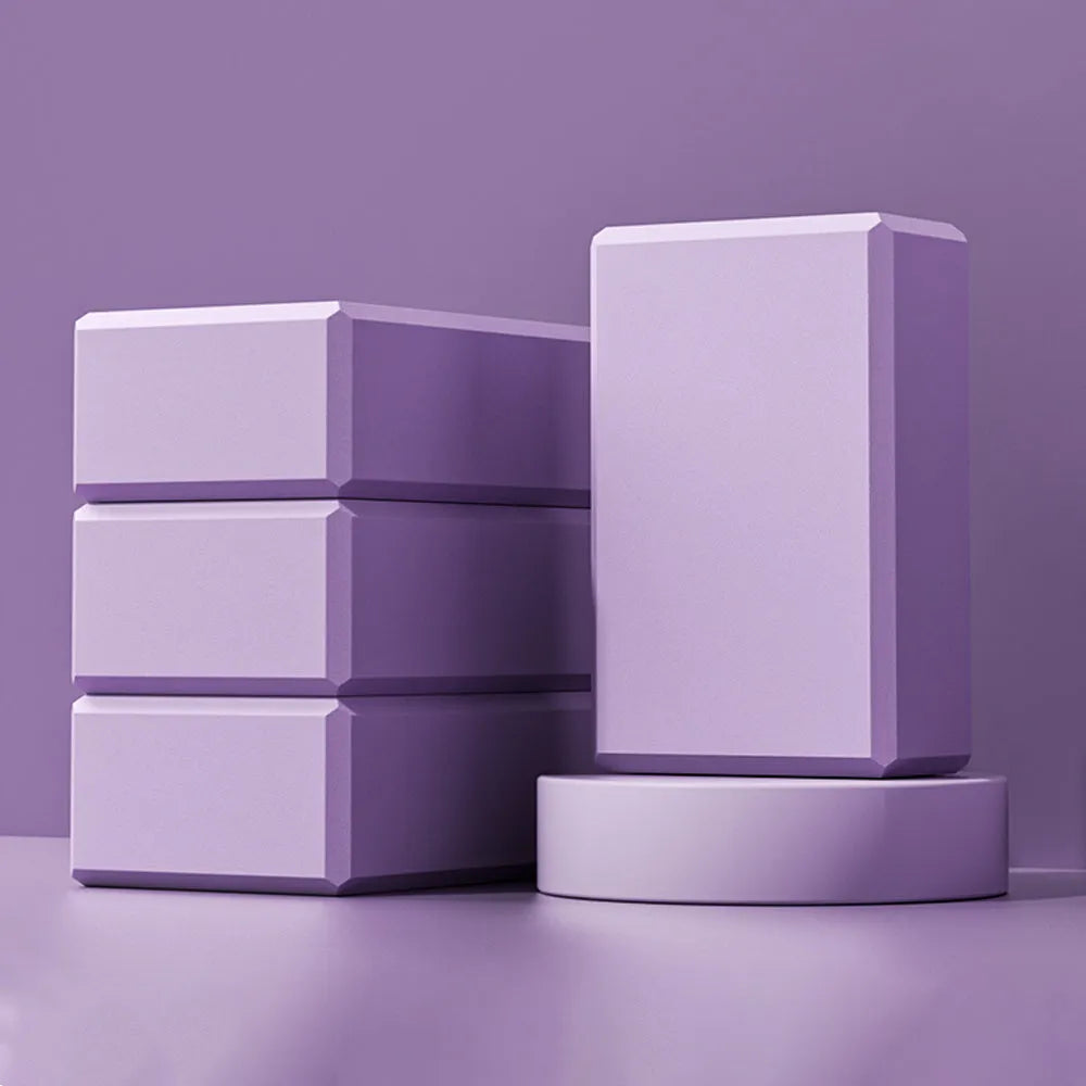 Solid colour EVA foam yoga block showing hexagonal facets and grip ridges