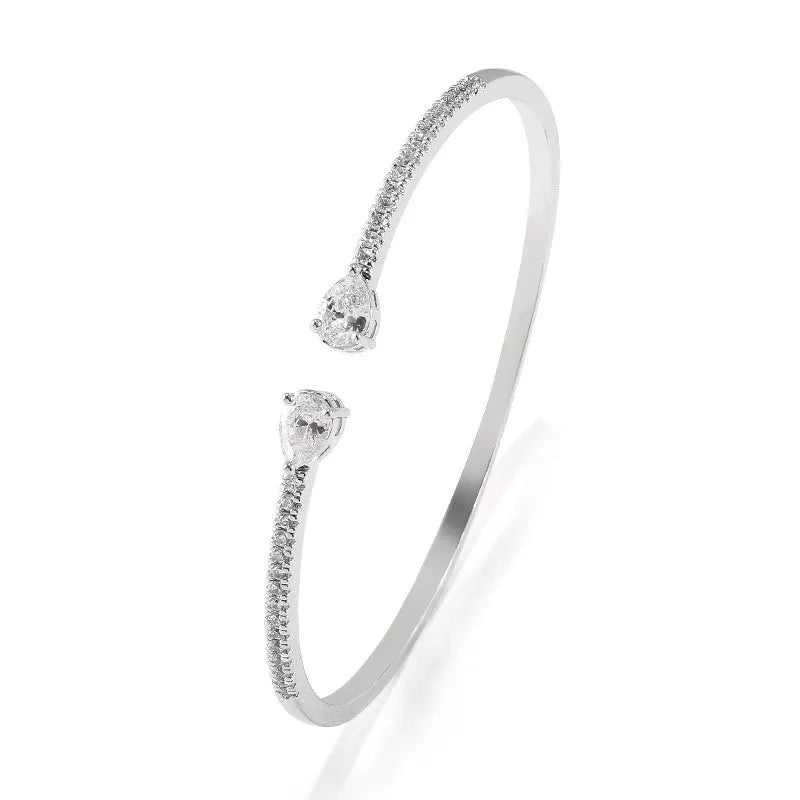 Copper personalised bracelet with multi-zircon inlaid design in simple style, shown in blue and white colour options.