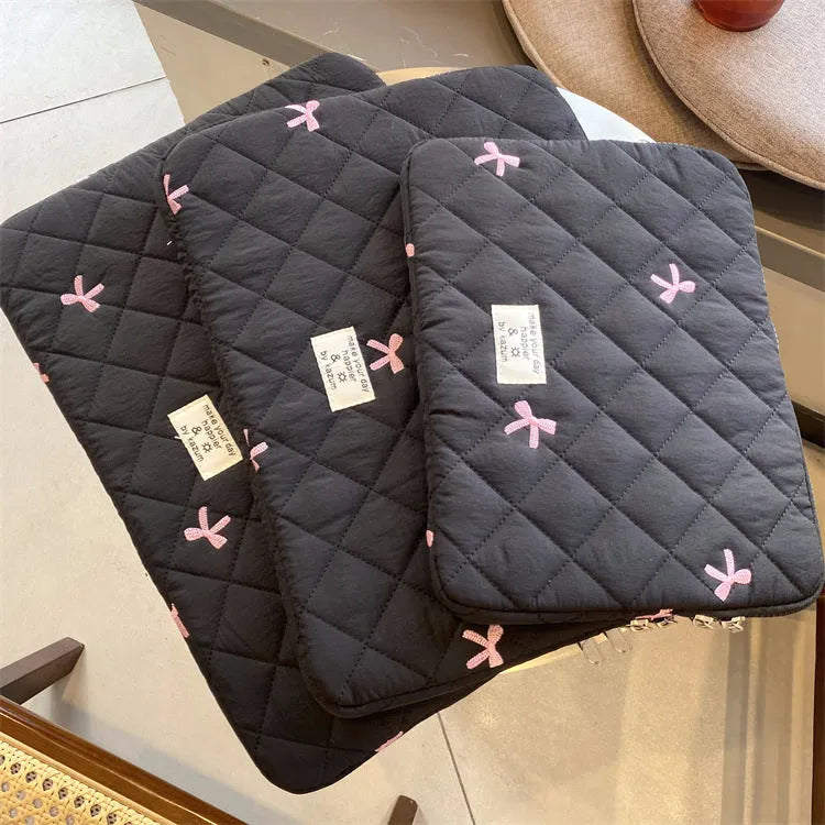 Notebook storage bag with rhombus embroidery and bow decoration in nylon fabric