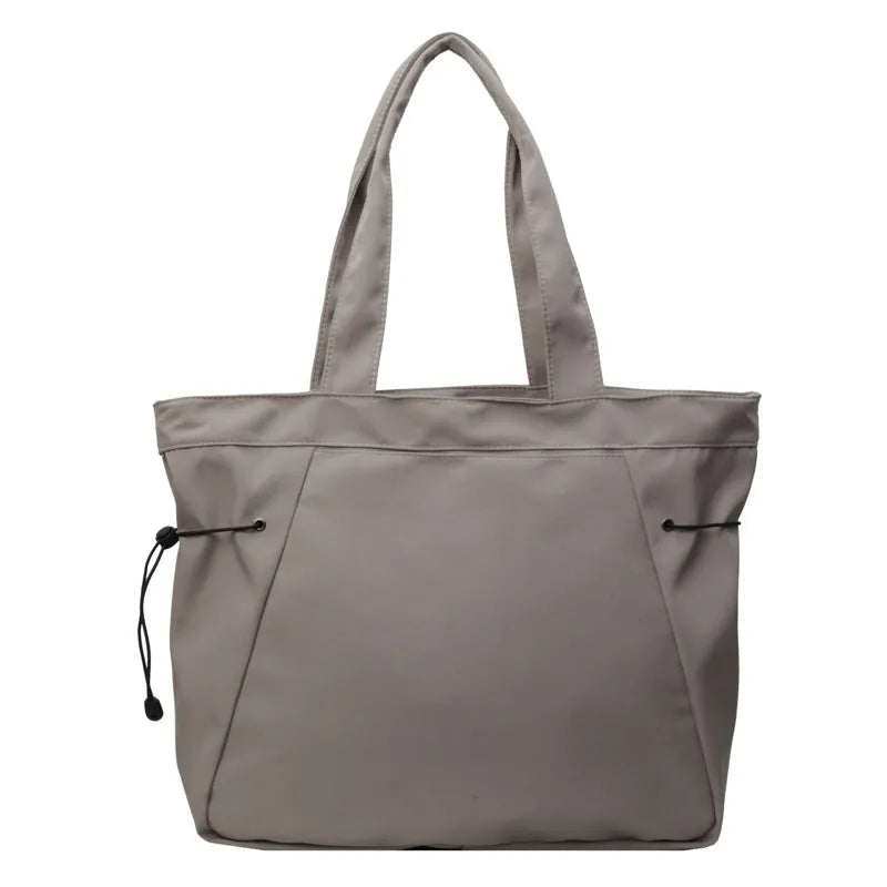 Soft Oxford cloth folding commuter tote bag in street style design showing colour options