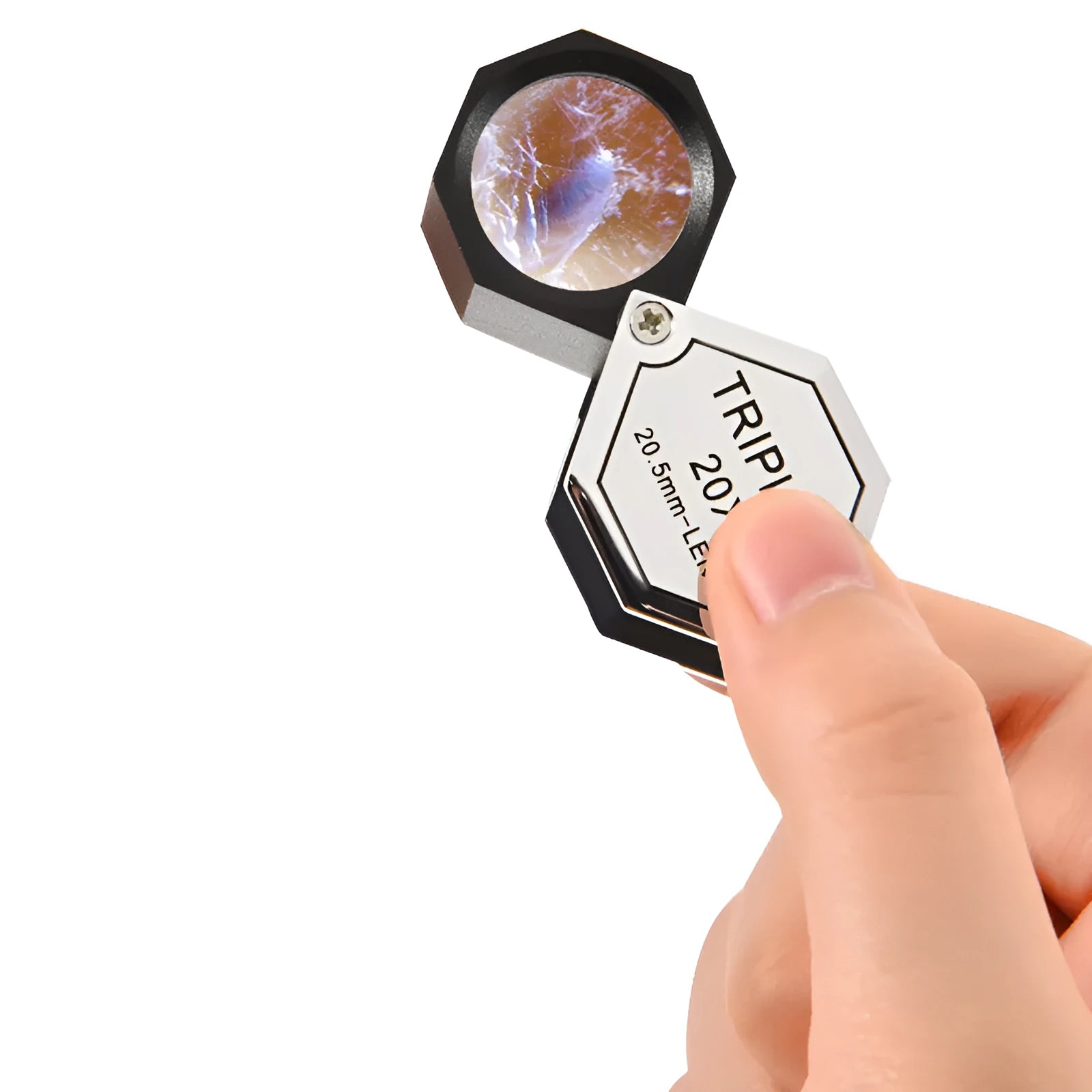 Handheld metal magnifying glass with optical lens for jewellery and stamp identification.
